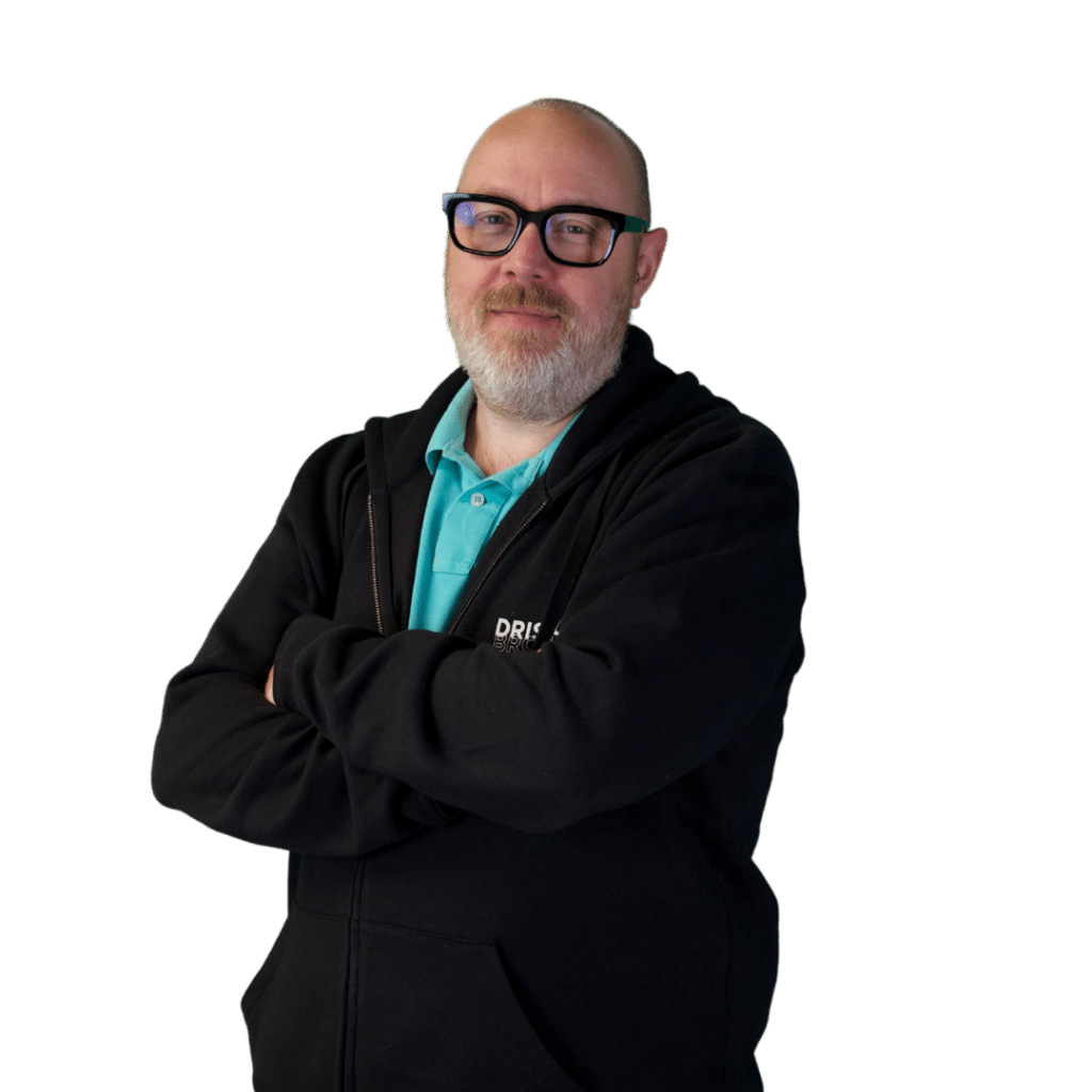 A picture of Paul stood on an angle with his arms folded