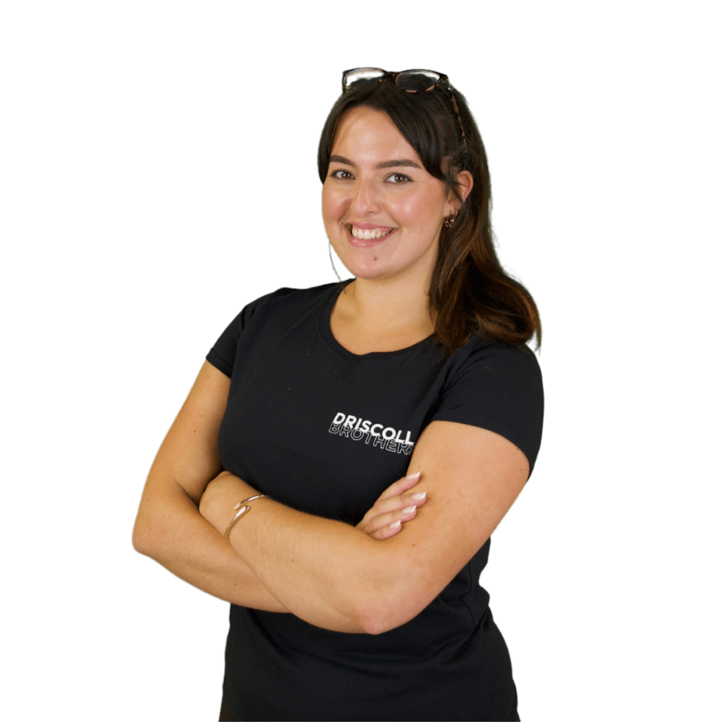 A picture of Tess stood on an angle with her arms folded