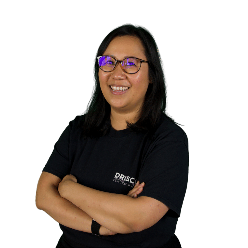 A picture of Vicki stood on an angle with her arms folded